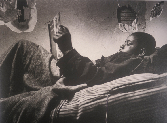Norman Jr. Reading in Bed, Gordon Parks